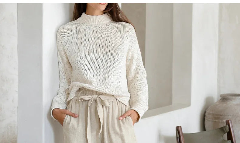 FJØRNA linen wide-leg trousers for women, loose pull-on pants with a relaxed fit and breathable fabric, shown on a model.