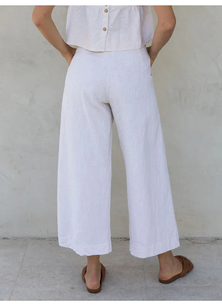 FJØRNA women's linen cropped culotte trousers featuring a wide-leg design, light and breathable fabric for casual style.