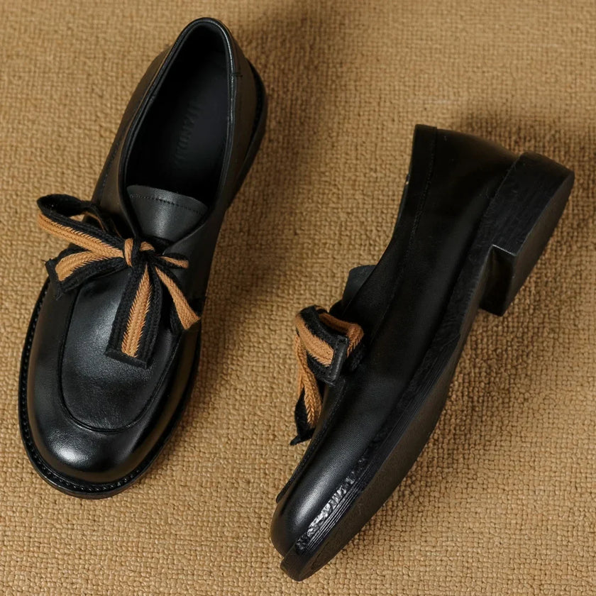 FJØRNA women's dual-tone leather loafers with handcrafted design and cushioned insoles, stylish slip-on shoes for women.