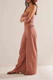 Women's knit wide-leg trousers by FJØRNA, loose pull-on pants with a relaxed fit, shown in a soft, cozy fabric.