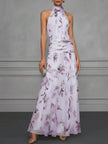 FJØRNA Jasmine floral halter wedding guest dress with elegant design and vibrant floral pattern, perfect for special occasions.