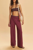 Women's knit wide-leg trousers from FJØRNA, loose pull-on pants with a relaxed fit and soft fabric, ideal for casual wear.