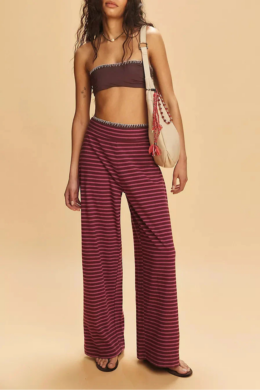 Women's knit wide-leg trousers from FJØRNA, loose pull-on pants with a relaxed fit and soft fabric, ideal for casual wear.