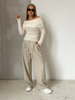 FJØRNA ribbed knit off-shoulder women’s top with mock neck, stylish and fitted for casual or dressy occasions.