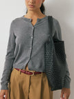 FJØRNA women's longline button-front knit cardigan, soft and stylish women's top with a cozy, open-front design.