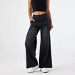 Women’s wide-leg lace jeans by FJØRNA featuring high waist and stylish design, shown in the product image.