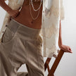 FJØRNA women's wide leg denim trousers, stylish and comfortable, featuring classic blue denim fabric and a relaxed fit.