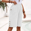 FJØRNA lightweight summer dress for women, breathable and flowy, perfect for warm weather, shown in a relaxed fit.