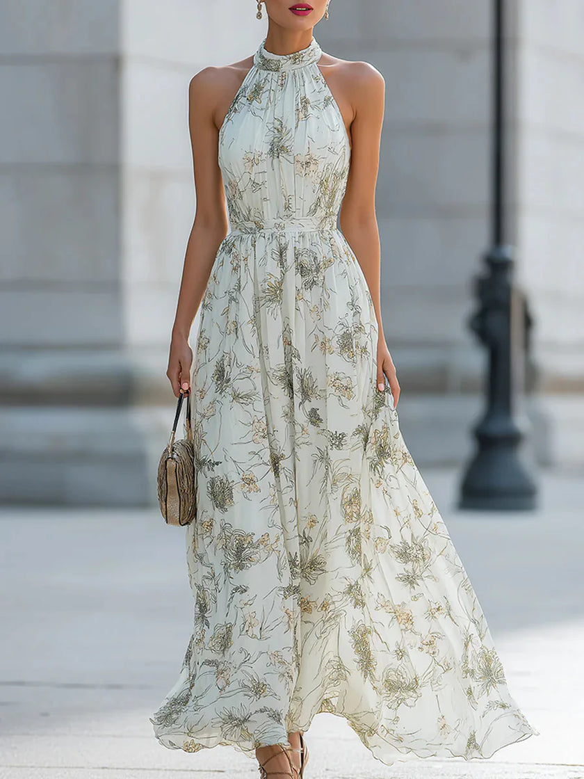 FJØRNA Fiona Flowy Halter Maxi Dress in white, elegant sleeveless dress with a flowing skirt and halter neckline.