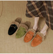 FJØRNA women's plush fur mule slippers with slip-on design and cozy lining, ideal for comfortable indoor wear.
