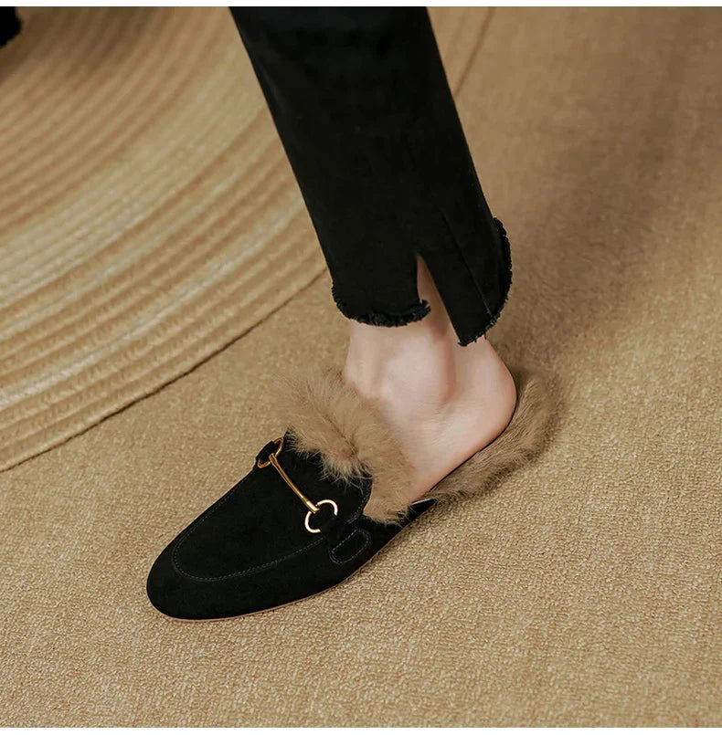 FJØRNA women's fur mule slippers with plush lining and slip-on design, showcasing cozy, luxurious footwear style.