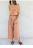 Women’s linen cropped culotte trousers by FJØRNA, wide-leg linen pants featuring relaxed fit and breathable fabric.