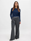 FJØRNA women's longline knit cardigan with button-front design, featuring a cozy, stylish top perfect for layered looks.