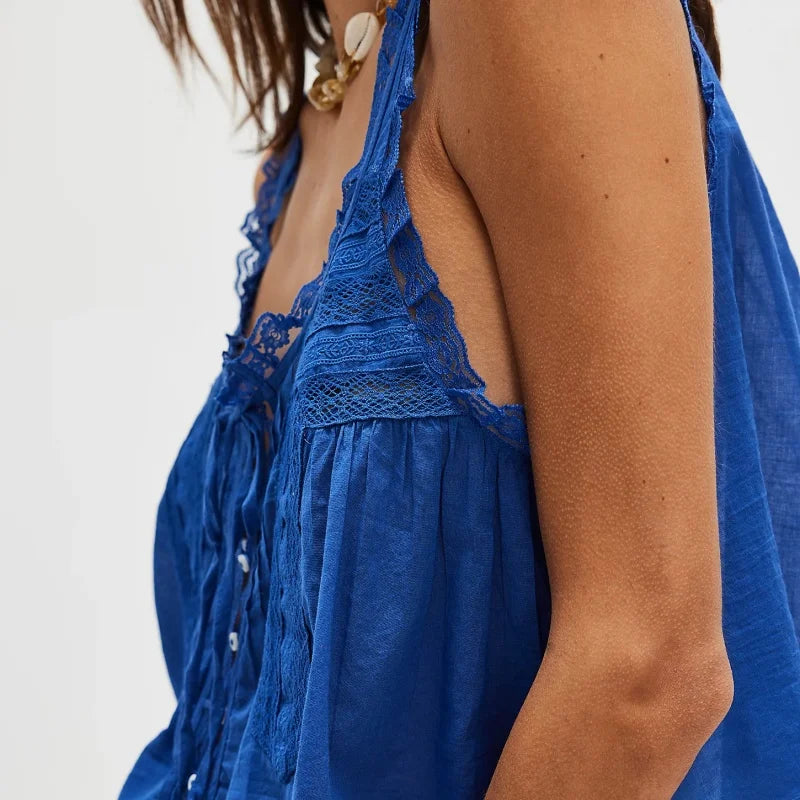 FJØRNA women's lace cami top with front tie, featuring delicate lace fabric and a stylish, feminine design.