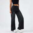 FJØRNA women's lace jeans with wide leg and high waist, showcasing the stylish denim pants with intricate lace details.