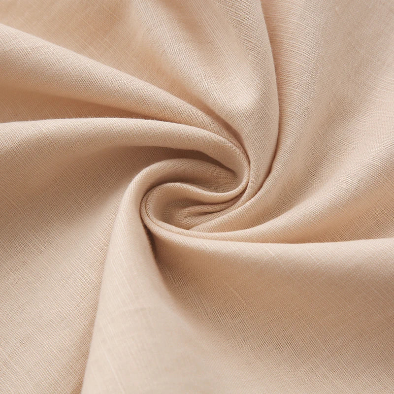 FJØRNA women's knit wide-leg trousers with elastic waistband, showcasing soft fabric and relaxed fit in a neutral color.