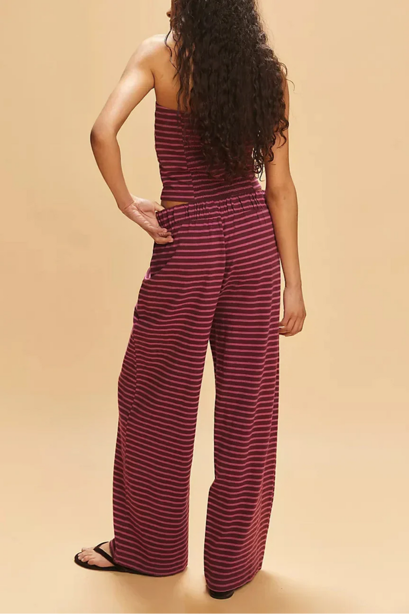 Women’s knit wide-leg trousers by FJØRNA featuring loose, pull-on style, soft fabric, and relaxed fit for comfortable casual wear.