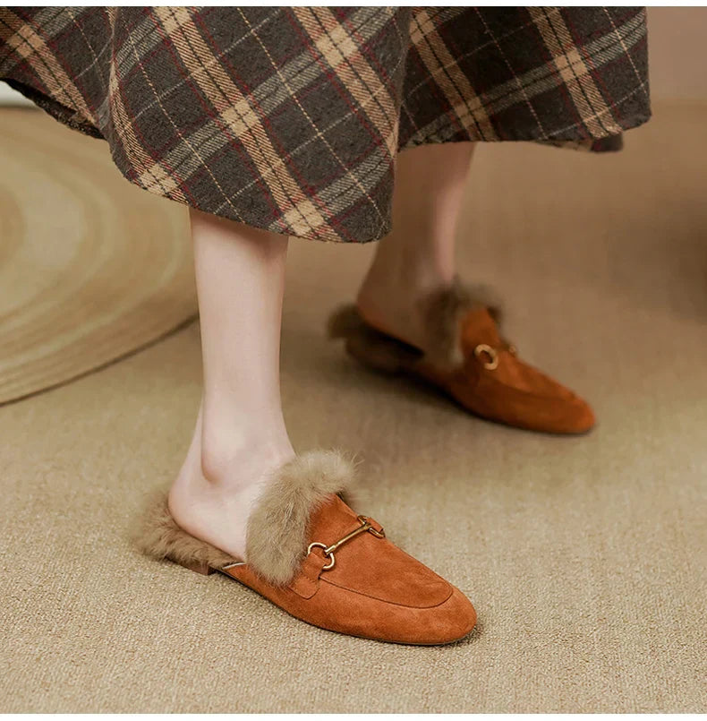 FJØRNA women's plush fur mule slippers with slip-on design and cozy lining, perfect for indoor comfort and luxury footwear.
