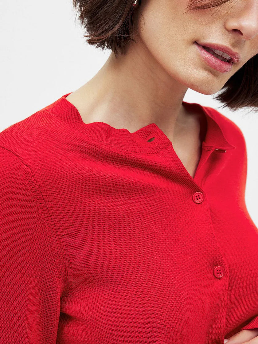 FJØRNA longline women's button-front knit cardigan, stylish and cozy women's top with a relaxed fit, shown in a flattering color.