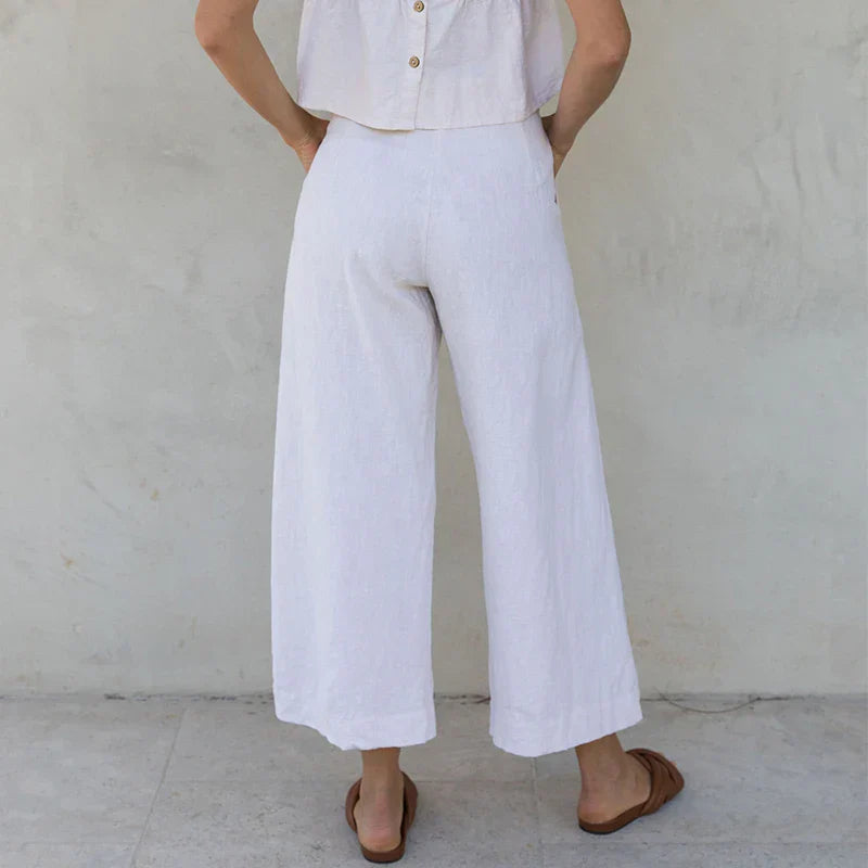 FJØRNA women's linen cropped culotte trousers with wide-leg fit, lightweight and breathable for a stylish summer look.