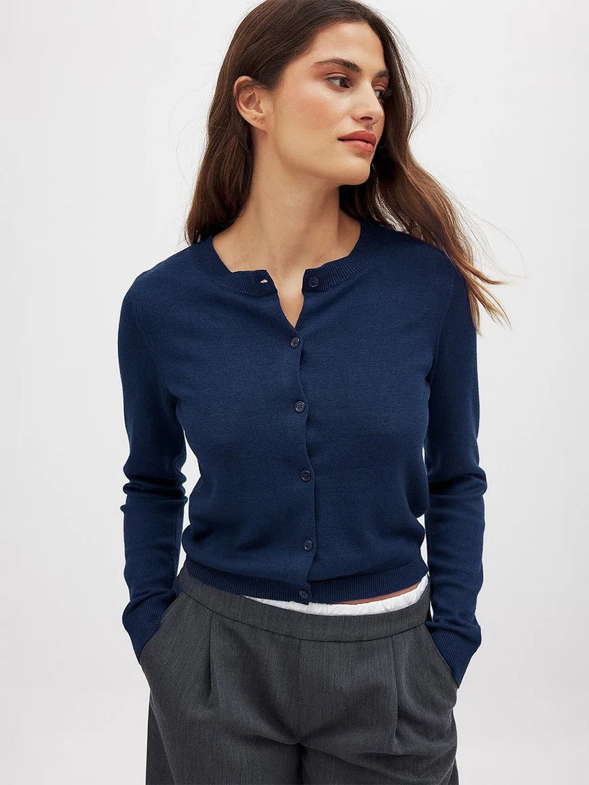 FJØRNA women's longline button-front knit cardigan, stylish women's top with a cozy, longline design and front buttons.