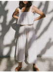 FJØRNA women's linen cropped culotte trousers with wide-leg fit, stylish lightweight linen pants for a casual, breezy look.
