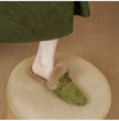 FJØRNA women's plush fur mule slippers with slip-on design and cozy lining, ideal for comfortable indoor footwear.