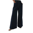 Blue denim wide-leg drawstring jeans for women by FJØRNA, relaxed fit pants with a casual, comfortable style.