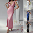 FJØRNA elegant midi dress for women, sleeveless V-neck style with a flowy silhouette, perfect for sophisticated occasions