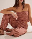 Women's FJØRNA knit wide-leg trousers with a loose, pull-on design, shown in a relaxed fit and soft fabric.