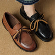 FJØRNA women's dual-tone leather loafers with cushioned insoles, handcrafted shoes featuring stylish design and comfortable fit.