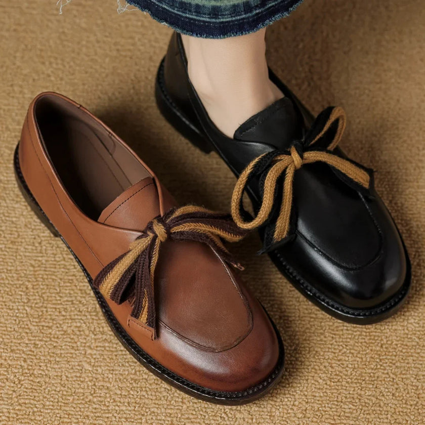 FJØRNA women's dual-tone leather loafers with cushioned insoles, handcrafted shoes featuring stylish design and comfortable fit.
