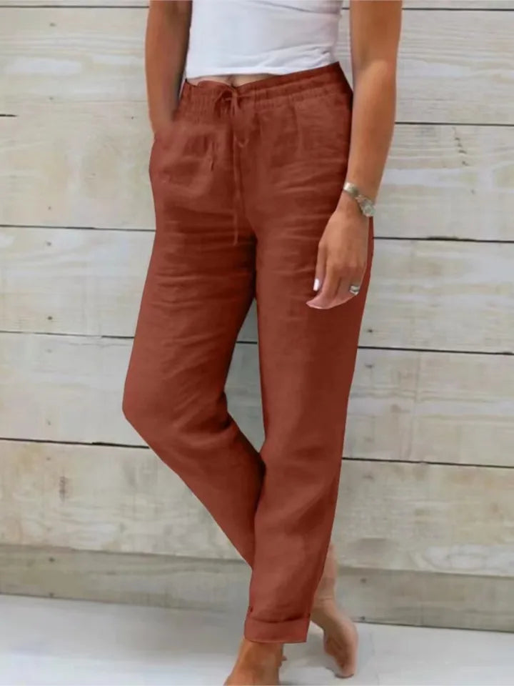FJØRNA women's lightweight summer jogger pants with wide leg and tapered fit, shown in a relaxed fit on a model