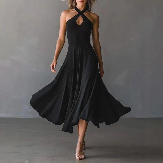 FJØRNA Josie Flowy A-Line Maxi Dress in white, lightweight and elegant, with a fitted bodice and flowing skirt, perfect for summer.