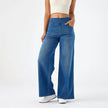 FJØRNA women's lace jeans with wide-leg and high waist design, shown on a model, casual stylish pants for women.