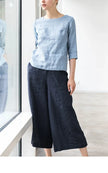 FJØRNA linen wide-leg trousers for women with drawstring pull-on design, lightweight and comfortable for casual wear.