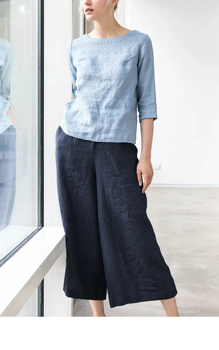 FJØRNA linen wide-leg trousers for women with drawstring pull-on design, lightweight and comfortable for casual wear.