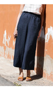 FJØRNA linen wide leg women's trousers with drawstring waistband, pull-on style, soft and breathable fabric, relaxed fit.