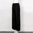 FJØRNA women's cotton linen wide leg trousers with drawstring pull-on design, showcasing relaxed fit and breathable fabric.