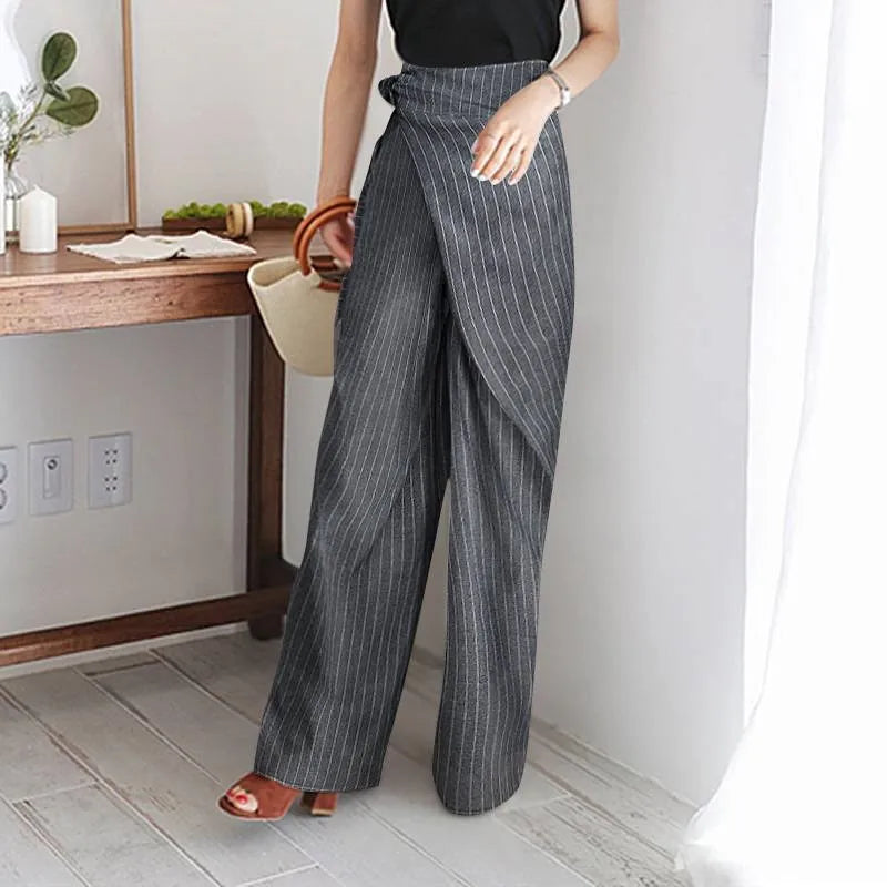 Women's high-waist cotton wide-leg trousers by FJØRNA, featuring a loose pull-on style and relaxed fit.