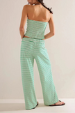 Women's knit wide-leg trousers by FJØRNA featuring loose, pull-on style and comfortable fit in a cozy knitted fabric.