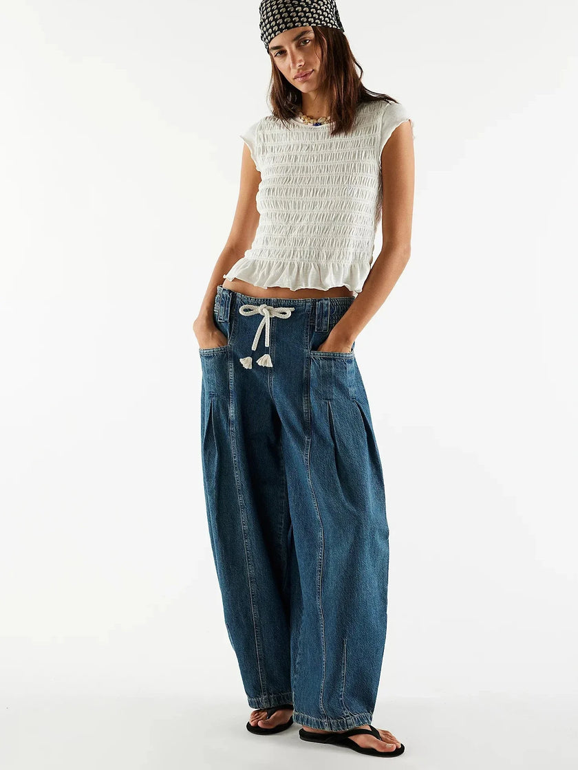 FJØRNA women's cotton wide-leg drawstring jeans with relaxed fit and stylish design, shown in a natural stance.