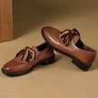 FJØRNA women's dual-tone leather loafers featuring handcrafted design and cushioned insoles for comfortable stylish shoes.
