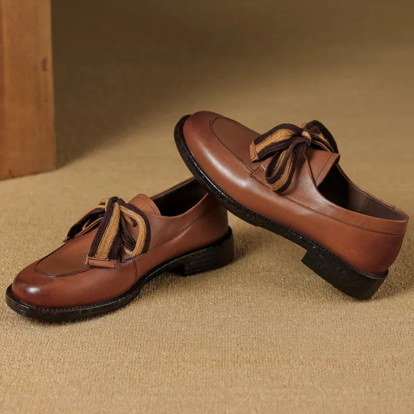 FJØRNA women's dual-tone leather loafers featuring handcrafted design and cushioned insoles for comfortable stylish shoes.