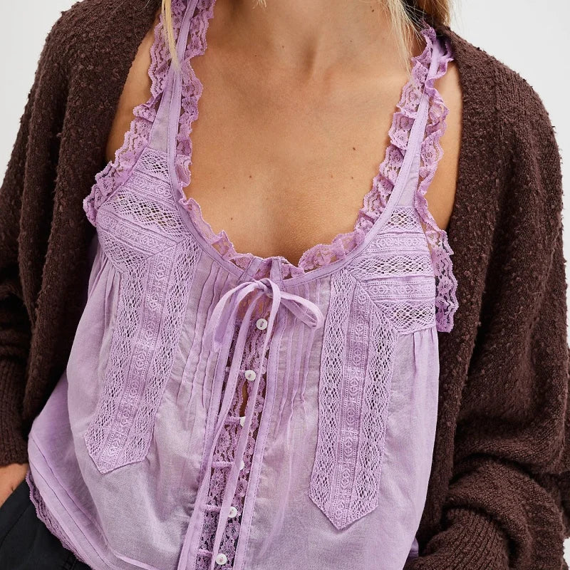 FJØRNA women's lace cami top with front tie, featuring delicate lace fabric and adjustable straps for a stylish, feminine look.