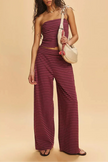 FJØRNA women's knit wide-leg trousers with loose fit and pull-on design, shown in soft, textured fabric.