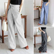 Women's high-waist cotton wide-leg trousers from FJØRNA, featuring a loose pull-on design and relaxed fit.