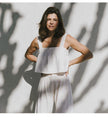 FJØRNA women's linen cropped culotte trousers with wide-leg design, light and breathable fabric, shown on a model.