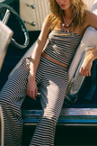 Women's knit wide-leg trousers from FJØRNA featuring loose pull-on style and comfortable fit, shown in a casual, relaxed look.