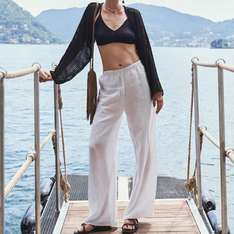 FJØRNA women's knit wide leg trousers with drawstring waist, soft fabric, and relaxed fit, perfect for casual or comfortable wear.